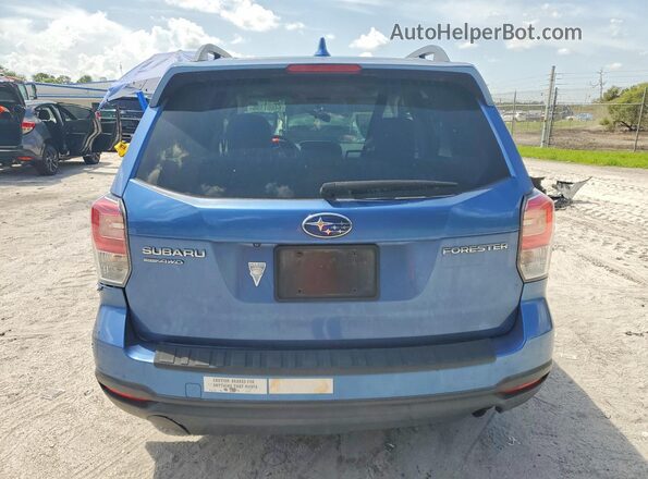 JF2SJAGC4JH471729 2018 SUBARU FORESTER Blue უკანა ხედი