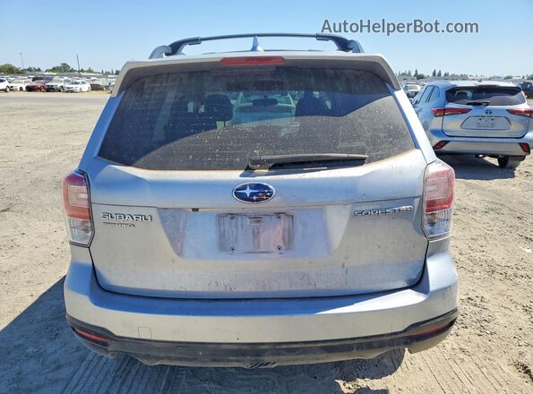 JF2SJAGC5JH415220 2018 SUBARU FORESTER Silver Vista trasera