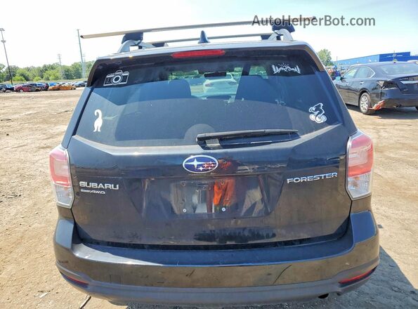 JF2SJAGC5JH551699 2018 SUBARU FORESTER Black Vista trasera