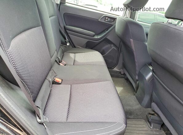 JF2SJAGC7JH487603 2018 SUBARU FORESTER Black Widok wnętrza z tyłu