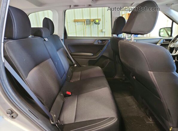 JF2SJAGC8HH584450 2017 SUBARU FORESTER Silver Rear interior view