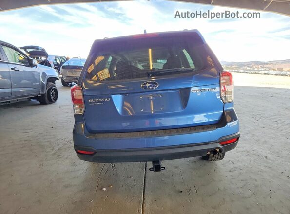 JF2SJAGC9JH447023 2018 SUBARU FORESTER Blue Вид ззаду