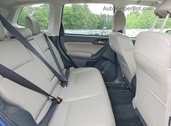 JF2SJAHC1GH426352 2016 SUBARU FORESTER Blue Vista interior trasera