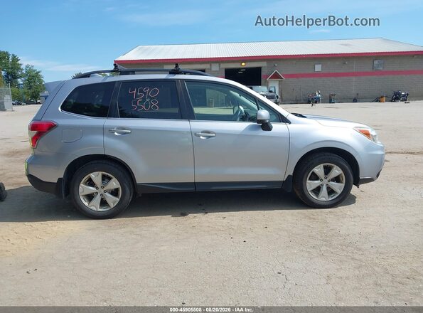 JF2SJAHC5GH555646 2016 SUBARU FORESTER Silver Вид задньої частини салону