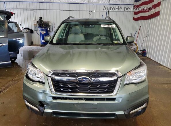 JF2SJAJC3HH401674 2017 SUBARU FORESTER Green Front view