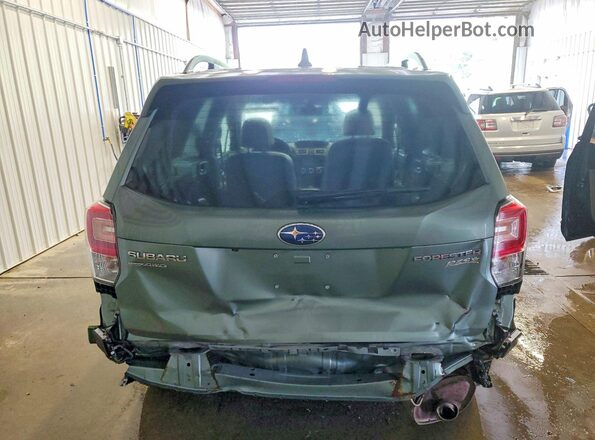 JF2SJAJC3HH401674 2017 SUBARU FORESTER Green Rear view