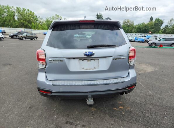 JF2SJAJC3JH464067 2018 SUBARU FORESTER Silver Widok z tyłu