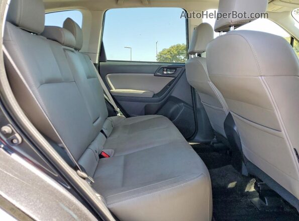 JF2SJAJC4HH577519 2017 SUBARU FORESTER Charcoal Vista interior trasera