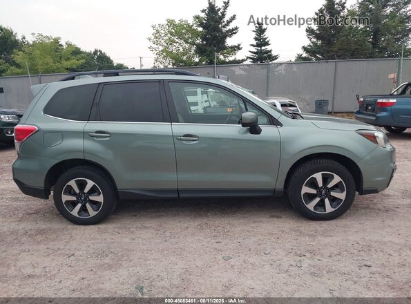 JF2SJAJC6HH535756 2017 SUBARU FORESTER Green Vista interior trasera