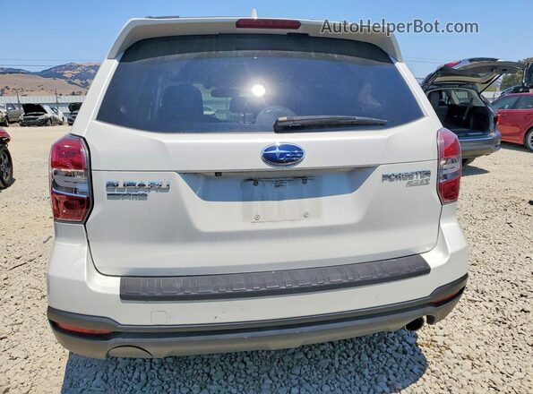 JF2SJARC0GH424218 2016 SUBARU FORESTER White Rear view