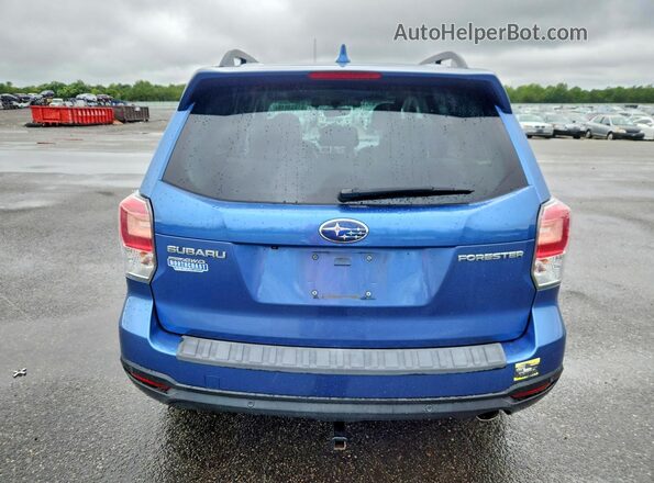 JF2SJARC1JH570814 2018 SUBARU FORESTER Blue Vista trasera