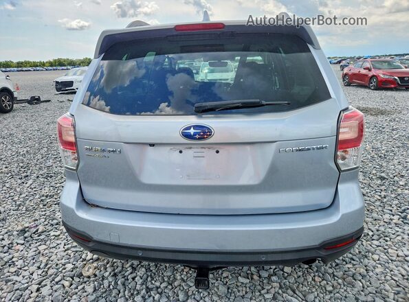 JF2SJARC2JH405595 2018 SUBARU FORESTER Silver Rear view