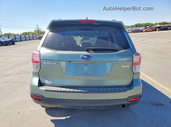 JF2SJARC5HH530973 2017 SUBARU FORESTER Green Vista trasera