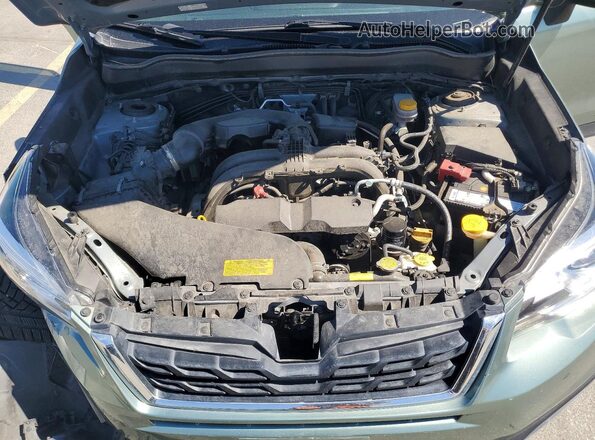 JF2SJARC5HH530973 2017 SUBARU FORESTER Green Vista del compartimento del motor