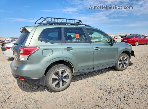 JF2SJARC5HH585052 2017 SUBARU FORESTER Green Tył prawy
