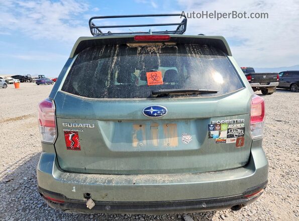 JF2SJARC5HH585052 2017 SUBARU FORESTER Green Widok z tyłu