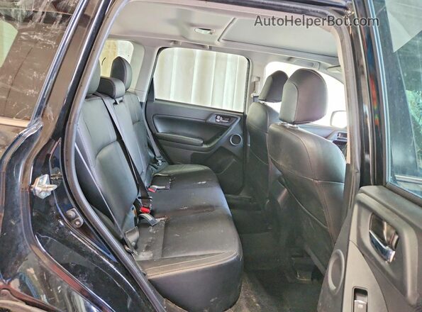 JF2SJARC5JH453351 2018 SUBARU FORESTER Black Widok wnętrza z tyłu