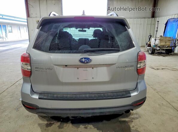 JF2SJARC6GH494256 2016 SUBARU FORESTER Silver Vista trasera
