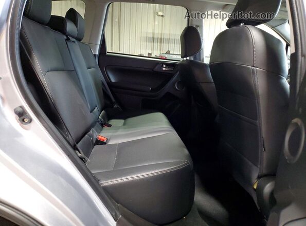 JF2SJARC6GH494256 2016 SUBARU FORESTER Silver Vista interior trasera