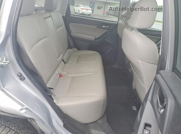 JF2SJAVC5GH516026 2016 SUBARU FORESTER Silver Rear seats view