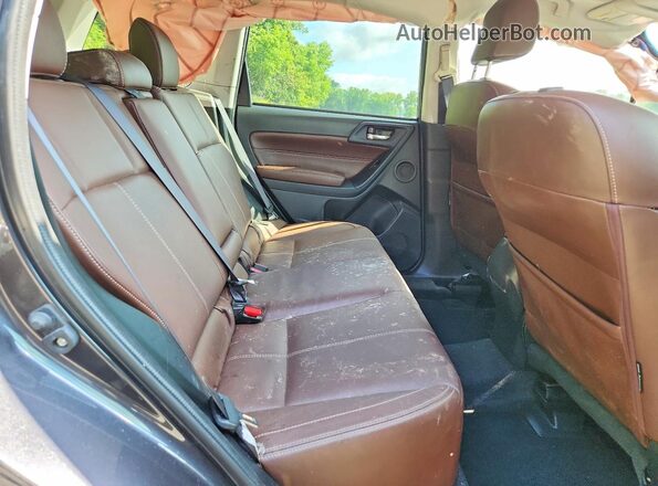 JF2SJAWC2HH805736 2017 SUBARU FORESTER Black Rear interior view