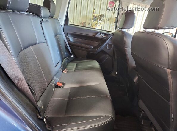 JF2SJAWC7HH811385 2017 SUBARU FORESTER Blue Vista de los asientos traseros