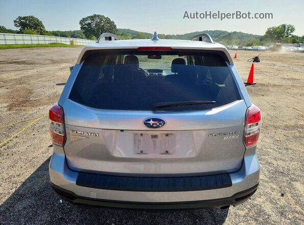 JF2SJAXCXGH407719 2016 SUBARU FORESTER Silver Vista trasera