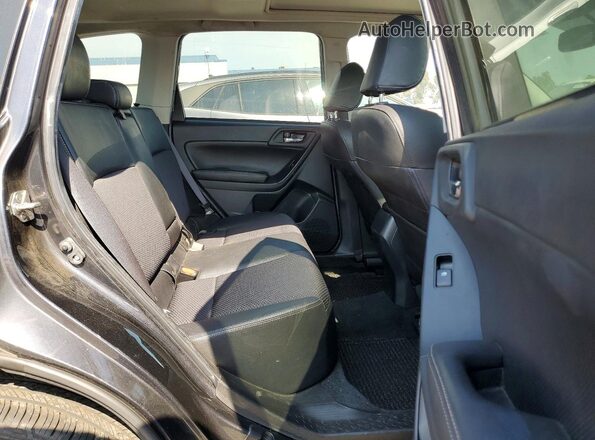 JF2SJGDC3GH411800 2016 SUBARU FORESTER Black Vista interior trasera
