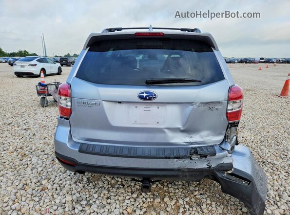 JF2SJGDC6GH503399 2016 SUBARU FORESTER Silver Vista trasera