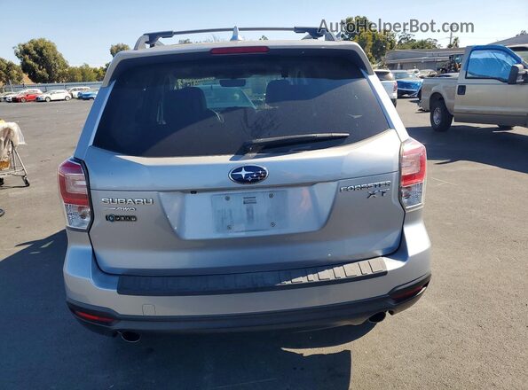 JF2SJGECXHH435575 2017 SUBARU FORESTER Silver Rear view