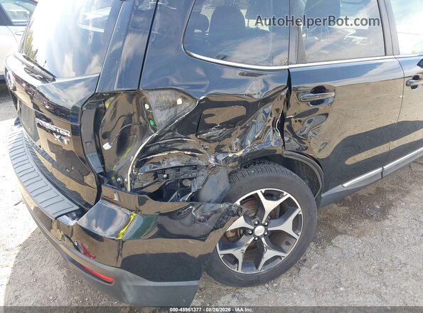JF2SJGVC4GH557024 2016 SUBARU FORESTER Black Front view