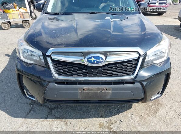 JF2SJGVC4GH557024 2016 SUBARU FORESTER Black Rear interior view