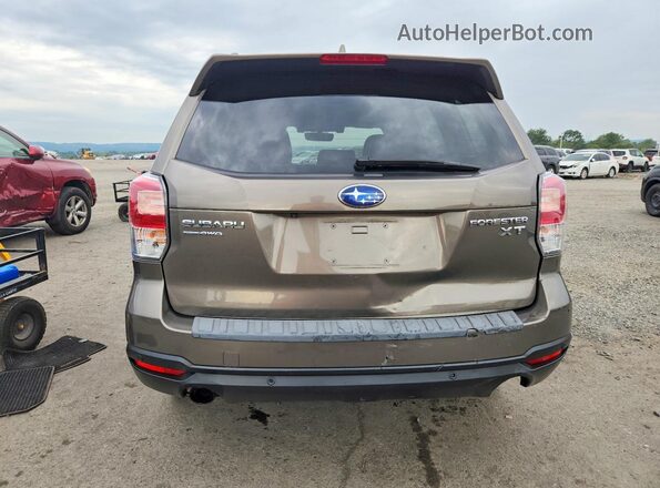 JF2SJGWC3HH503102 2017 SUBARU FORESTER Желто-коричневый Вид сзади