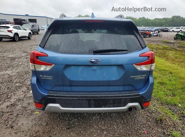 JF2SKAXC0MH557573 2021 SUBARU FORESTER Blue Rear view
