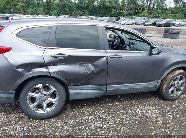 JHLRW2H52KX010902 2019 HONDA CR-V Gray Vista interior trasera