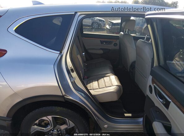 JHLRW2H87KX019184 2019 HONDA CR-V Silver VIN կոդի պիտակի տեսք