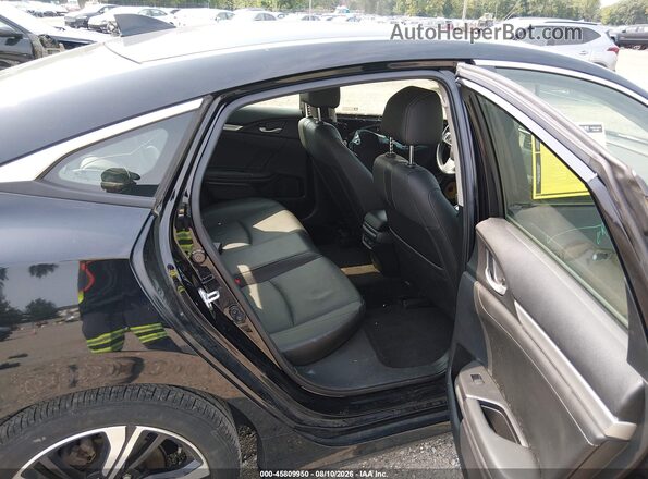 JHMFC1F95JX016523 2018 HONDA CIVIC Black Vista de la etiqueta del VIN