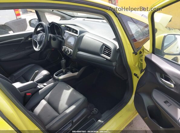 JHMGK5H99HS013885 2017 HONDA FIT Желтый Вид салона спереди