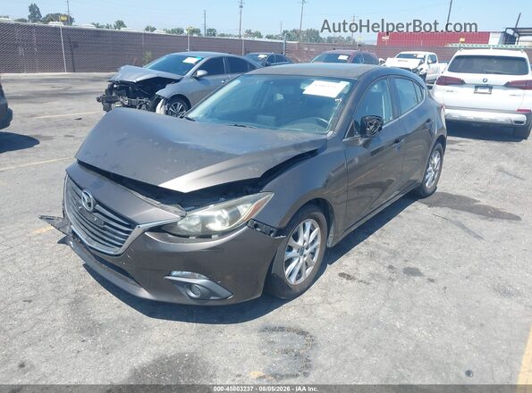 JM1BM1M79G1281083 2016 MAZDA 3 Gray Vista tres cuartos delantera izquierda