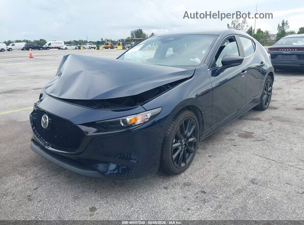 JM1BPAKM9R1714386 2024 MAZDA 3 Navy Vista tres cuartos delantera izquierda