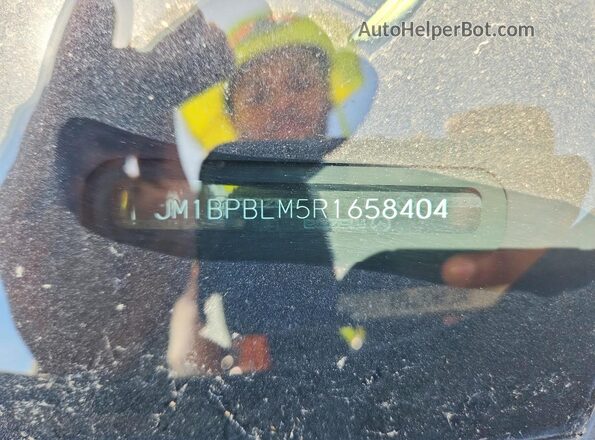 JM1BPBLM5R1658404 2024 MAZDA 3 Blue Vista del compartimento del motor