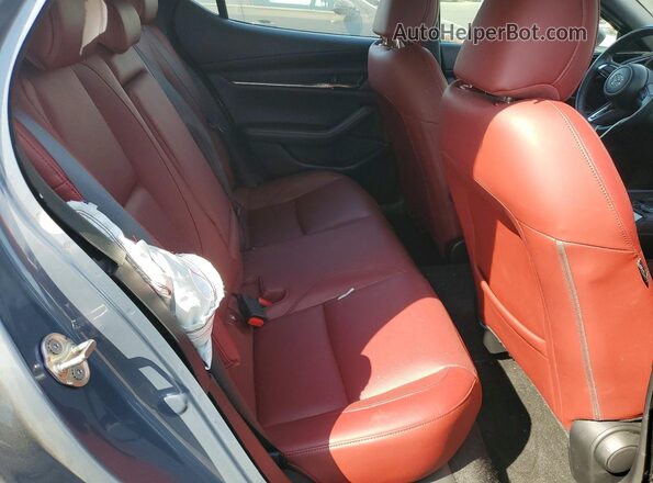 JM1BPBLMXR1718645 2024 MAZDA 3 Blue Vista de los asientos traseros
