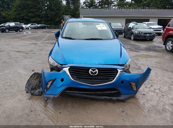JM1DKBC73G0119686 2016 MAZDA CX-3 Blue Vista interior trasera