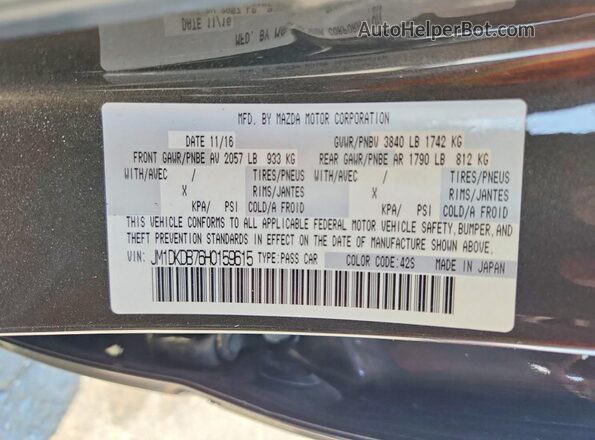 JM1DKDB76H0159615 2017 MAZDA CX-3 Gray Vista del compartimento del motor