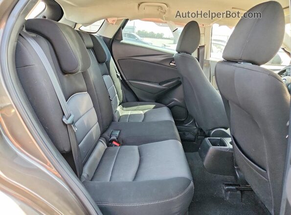 JM1DKDB76H0159615 2017 MAZDA CX-3 Gray Vista de los asientos traseros