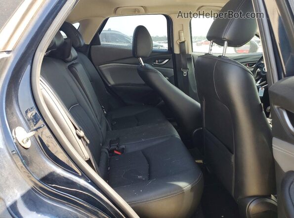 JM1DKDC74K0411884 2019 MAZDA CX-3 Blue Widok wnętrza z tyłu
