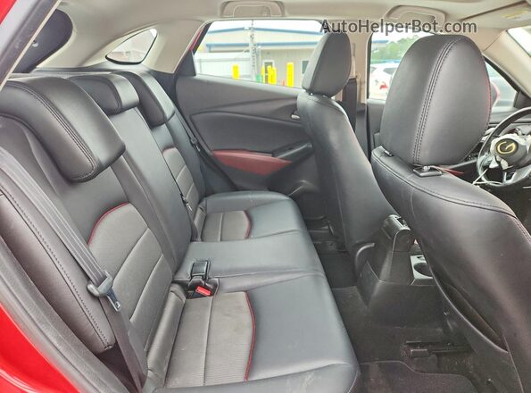 JM1DKDC75G0130877 2016 MAZDA CX-3 Red Vista interior trasera