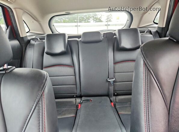 JM1DKDC75G0130877 2016 MAZDA CX-3 Red Vista de los asientos traseros