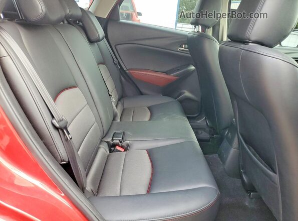 JM1DKDC7XG0127571 2016 MAZDA CX-3 Red Widok wnętrza z tyłu