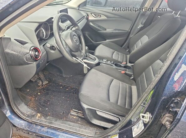 JM1DKFB70H0145995 2017 MAZDA CX-3 Blue Widok wnętrza z przodu